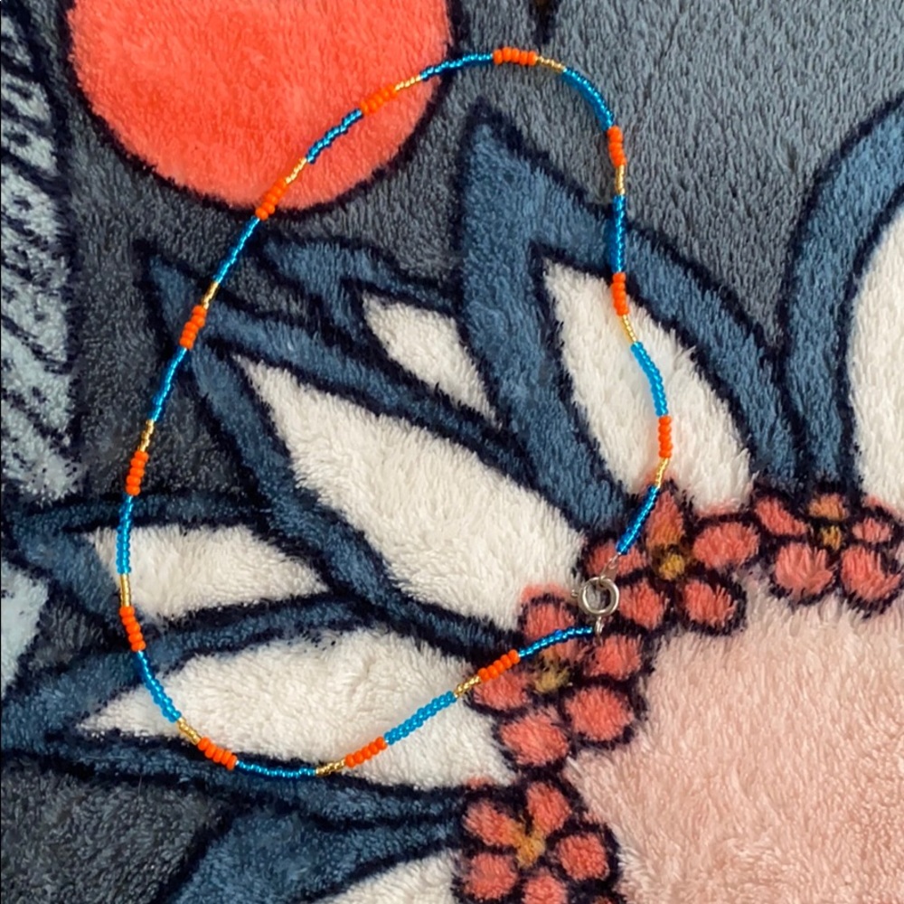 handmade blue, gold and orange seed bead choker